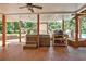 Covered patio featuring a hot tub and outdoor kitchen area, ideal for year-round enjoyment at 522 Golfview Dr, Peachtree City, GA 30269