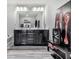 Modern bathroom with double vanity, large mirror and contemporary accents at 5512 Cascade Run, Atlanta, GA 30336