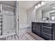 Bright bathroom featuring double vanity, soaking tub, walk-in shower and modern fixtures at 5512 Cascade Run, Atlanta, GA 30336