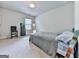 Cozy bedroom with neutral walls, carpet flooring, and a window for natural light at 5512 Cascade Run, Atlanta, GA 30336
