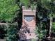 Community entrance sign for Cascade Place surrounded by lush landscaping at 5512 Cascade Run, Atlanta, GA 30336