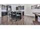 Open concept kitchen with a granite island and stainless steel appliances at 5512 Cascade Run, Atlanta, GA 30336