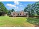 Picture of a large fenced backyard with a wood deck, perfect for outdoor relaxation and entertainment at 75 Fox Chase, Covington, GA 30016
