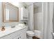 Cozy bathroom featuring a mirror, sink, shower, and toilet at 75 Fox Chase, Covington, GA 30016