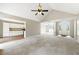Open-concept living room with vaulted ceiling and arched entry, great for entertaining and gatherings at 75 Fox Chase, Covington, GA 30016