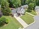 Beautiful home on a large, well-maintained lot with mature trees and lush landscaping at 2019 Aldbury Ln, Woodstock, GA 30189