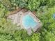 Aerial view of a community pool with plenty of chairs and lounge areas at 2019 Aldbury Ln, Woodstock, GA 30189