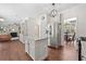 Spacious kitchen with stainless steel appliances, granite countertops, and an open layout to the dining area at 2019 Aldbury Ln, Woodstock, GA 30189