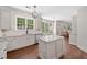 Stylish kitchen featuring granite countertops, stainless steel appliances, and hardwood floors at 2019 Aldbury Ln, Woodstock, GA 30189