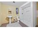 Bright bathroom featuring a new shower and stand-alone sink at 2030 Buford Dam Rd, Buford, GA 30518