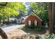 Attractive brick home with black shutters and landscaping at 2030 Buford Dam Rd, Buford, GA 30518