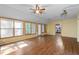 Sunroom featuring ample light from many windows and a doorway to another room at 2030 Buford Dam Rd, Buford, GA 30518