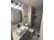 This bathroom features a modern sink, new tile, and a walk-in shower at 8236 Tudor Dr, Jonesboro, GA 30238