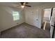 Image of the interior of a bedroom featuring new paint, carpet and a window at 8236 Tudor Dr, Jonesboro, GA 30238