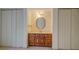 A vanity area is flanked by a double closet on each side at 1216 Valley Dr, Conyers, GA 30012