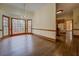 Dining room features hardwood floors, natural light, and access to the kitchen at 1216 Valley Dr, Conyers, GA 30012