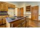 This classic kitchen features an island cooktop and plenty of cabinet space at 1216 Valley Dr, Conyers, GA 30012