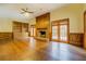Large living room featuring a fireplace, built-in shelves, and backyard access at 1216 Valley Dr, Conyers, GA 30012