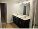 Spacious bathroom featuring a double sink vanity with ample counter space and cabinet storage at 305 Melanie Ct, Bowdon, GA 30108