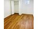 Basement bedroom with wood-look floors and a closet at 661 Kennesaw Se Dr, Smyrna, GA 30080