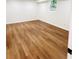 Basement bedroom with wood-look floors and a small window at 661 Kennesaw Se Dr, Smyrna, GA 30080