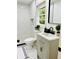 Stylish bathroom featuring modern fixtures, white tile, and a sleek vanity at 661 Kennesaw Se Dr, Smyrna, GA 30080