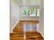 Bright living room with hardwood floors and a view to the exterior at 661 Kennesaw Se Dr, Smyrna, GA 30080