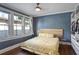 Charming bedroom featuring hardwood floors, a modern closet, and plenty of sunlight at 824 Greenwood Ne Ave # 8, Atlanta, GA 30306