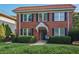 Charming brick home featuring a red tile roof, black shutters and mature landscaping at 824 Greenwood Ne Ave # 8, Atlanta, GA 30306