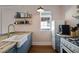 Cozy kitchen featuring modern appliances, butcher block countertops and wood floors at 824 Greenwood Ne Ave # 8, Atlanta, GA 30306