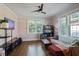 Bright living room featuring hardwood floors, ceiling fan and lots of natural light at 824 Greenwood Ne Ave # 8, Atlanta, GA 30306