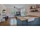 Open floor plan with kitchen island, wood floors, and lots of natural light at 824 Greenwood Ne Ave # 8, Atlanta, GA 30306