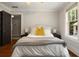 Bedroom featuring hardwood floors, large bed and natural light at 19 Wyman Se St, Atlanta, GA 30317