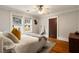 Bright bedroom featuring hardwood floors, and ceiling fan at 19 Wyman Se St, Atlanta, GA 30317