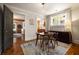 Elegant dining room featuring hardwood floors, a chandelier, and ample natural light at 19 Wyman Se St, Atlanta, GA 30317