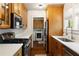 Modern kitchen with stainless steel appliances, white countertops, and ample cabinet space at 19 Wyman Se St, Atlanta, GA 30317