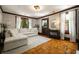 Bright living room featuring hardwood floors, natural light, and a comfortable sectional sofa at 19 Wyman Se St, Atlanta, GA 30317