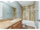 Stylish bathroom features a granite vanity and tiled shower at 502 Pryor Sw St # 6, Atlanta, GA 30312