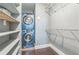 Functional laundry room with shelving and washer/dryer units at 502 Pryor Sw St # 6, Atlanta, GA 30312