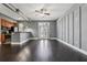 Bright living room features hardwood floors and ample natural light from the door to the outside at 502 Pryor Sw St # 6, Atlanta, GA 30312