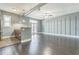 Bright living room with hardwood floors and views of kitchen and exterior doors at 502 Pryor Sw St # 6, Atlanta, GA 30312