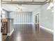 Spacious living room with hardwood floors and views of kitchen and doorway at 502 Pryor Sw St # 6, Atlanta, GA 30312