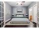 Well lit bedroom with walk through doors, wood floors, and neutral colors at 502 Pryor Sw St # 6, Atlanta, GA 30312