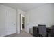 Bright bedroom featuring desk and a neutral wall color at 6345 Mountain Home Se Way, Mableton, GA 30126