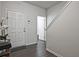 Foyer view of door and stairs with view to another room at 6345 Mountain Home Se Way, Mableton, GA 30126