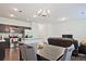 Open living space with a dining area, kitchen, and living room at 6345 Mountain Home Se Way, Mableton, GA 30126