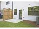 Home exterior featuring a patio, fenced yard, white siding, and a sliding glass door at 6345 Mountain Home Se Way, Mableton, GA 30126