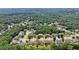 Community of homes with tree lined streets in a wooded, suburban neighborhood at 852 Van Briggle Path, Sugar Hill, GA 30518