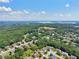 Scenic aerial shot featuring a residential area with a view of a serene lake at 852 Van Briggle Path, Sugar Hill, GA 30518