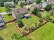Spacious backyard featuring a well-maintained lawn and decorative landscaping at 852 Van Briggle Path, Sugar Hill, GA 30518